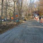Upper parking lot to be paved and curbed