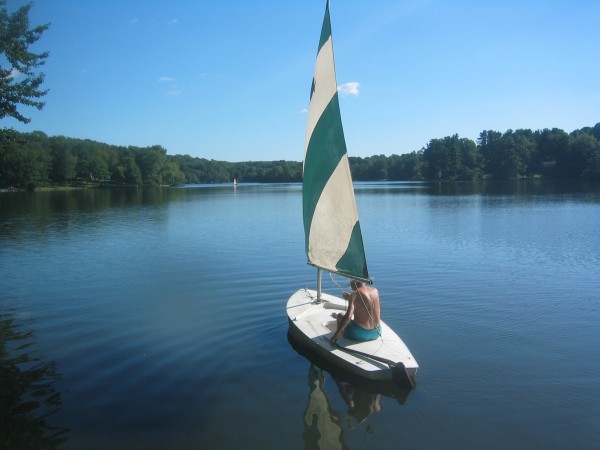 Jack Fles sailing off with 2006 President's Cup in hand.